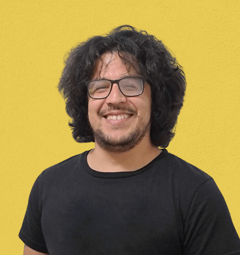 This is a headshot of Jose against a yellow background