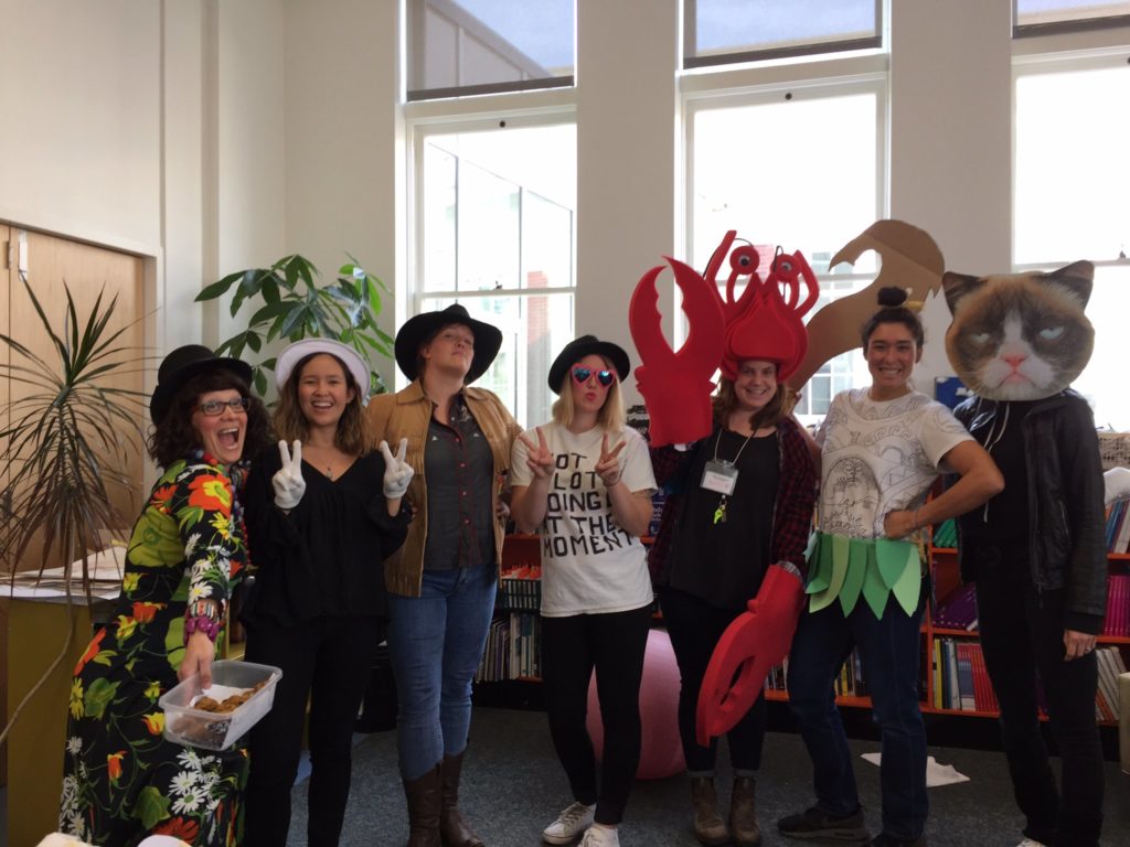 A group Volunteers from The Writers' Exchange wearing costumes 